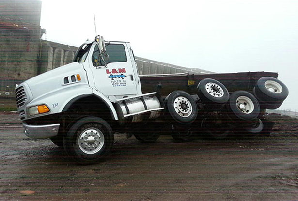 dump truck rolling over